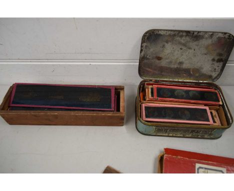 TWO BOXES CONTAINING MAGIC LANTERN SLIDES
