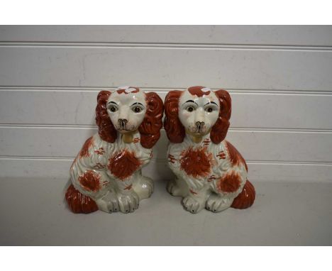PAIR OF STAFFORDSHIRE STYLE MODEL SPANIELS