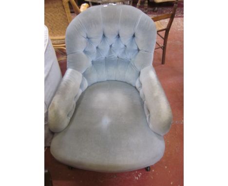 A Victorian iron frame button back chair 
