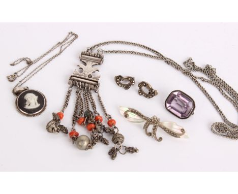 An amethyst brooch, a foreign silver chain necklace with red beads, a Wedgwood silver mounted pendant, a costume brooch and a