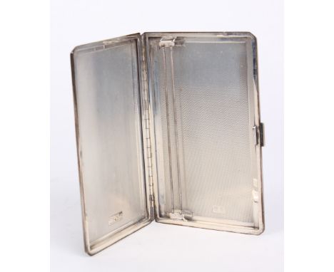 Silver; A silver engine turned cigarette case William Neale & Son Ltd, Birmingham, 1947 12cm wide 