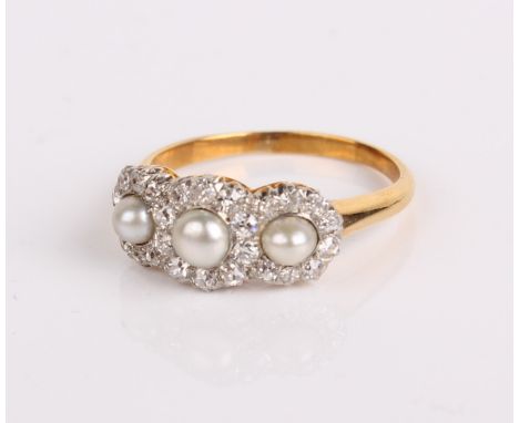 A gold, diamond and pearl cluster ring, 5.4g in total 
