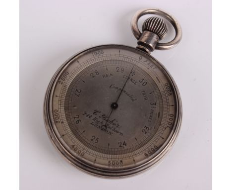 A silver cased Victorian pocket barometer, with adjustable altimeter made be C.Baker 244 High Holburn London and an ivory cas