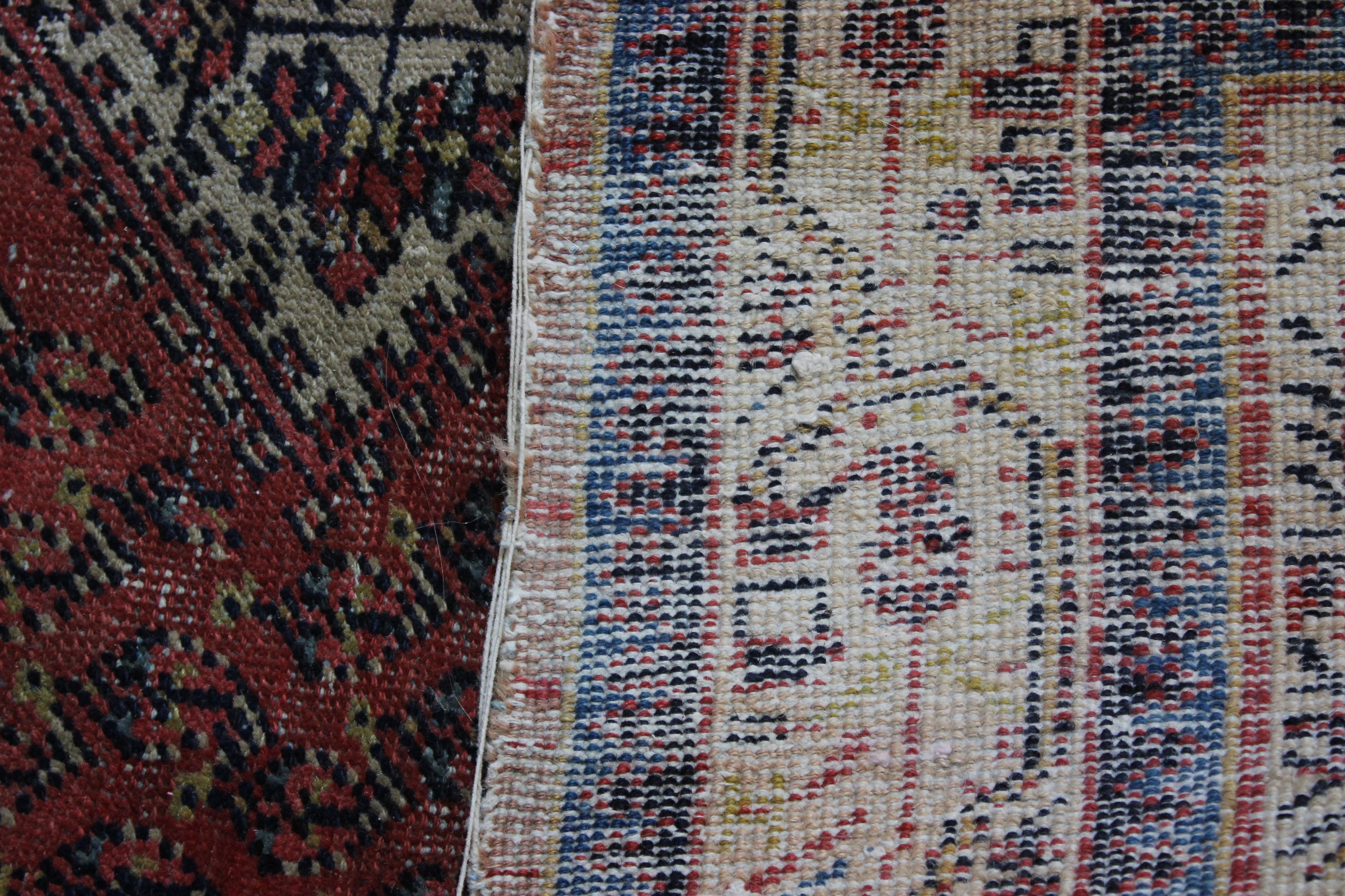 A North African Berber rug 133 x 280cm and a Middle Eastern carpet