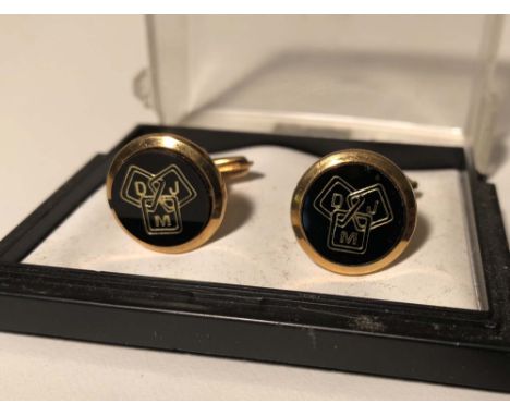 ELTON JOHN - DJM RECORDS PROMOTIONAL CUFFLINKS. Gold plated cufflinks with black and gold DJM logo on each. Housed in origina