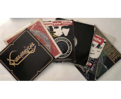QUEENSRYCHE SIGNED VINYL. A collection of seven items acquired by the vendor at various Queensrÿche shows. To include a 12" c
