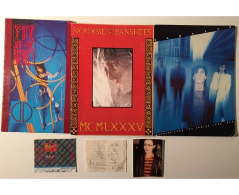 ROBERT SMITH AND SIOUXSIE SIGNED PAGE. Collection of memorabilia to include: lined page bearing signatures variously from Sio