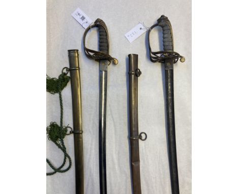 * Swords. A Victorian 1845 pattern infantry officer's sword, the 81.5 cm slightly curved blade with worn makers mark but prob