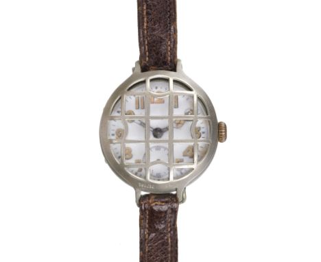 * Trench Watch. A WWI trench watch, circular white enamel dial with illuminated arabic numerals, subsidiary seconds dial with