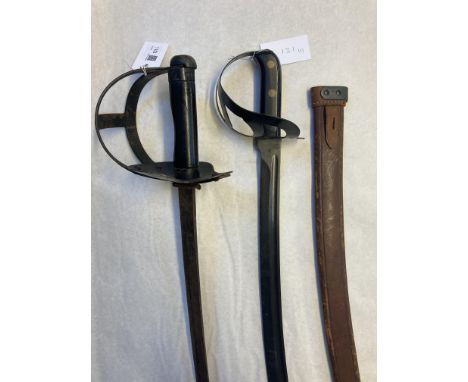 * Swords. Dutch / East Indies kleewang practice sword, the 62.5 curved steel blade with rounded tip, steel bowl guard, wooden