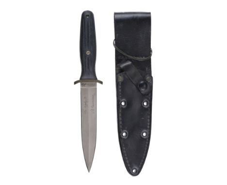 * Applegate Knife. A Blackjack Applegate Fairbairn "Fighting Knife", serial number '05620', in original leather scabbard. Wit