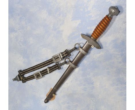 * German Dagger. WWII Luftwaffe dagger, the 25 cm plain blade (no maker) with eagle cross-guard and orange celluloid grip, ov