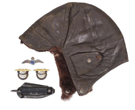 * Flying Helmet. An interwar period brown leather flying / motoring helmet, brown leather with Newby Brothers Ltd B'ham studs