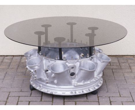 * Rolls Royce Coffee Table. A novelty coffee table, created from a highly polished Rolls Royce 'Avon' jet engine alloy castin