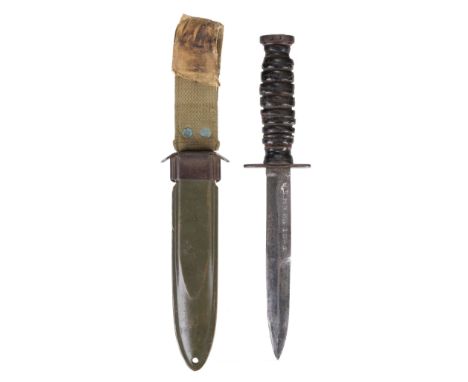 * Fighting Knife. WWII American M3 fighting knife dated 1943, the 16.5 cm blade stamped 'U.S. M3 PAL 1943', steel crossguard 