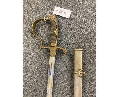 * Prussian Sword. A Prussian Artillery Officer's sword, the 78 cm slightly curved blade with cast brass langets, knucklebow a