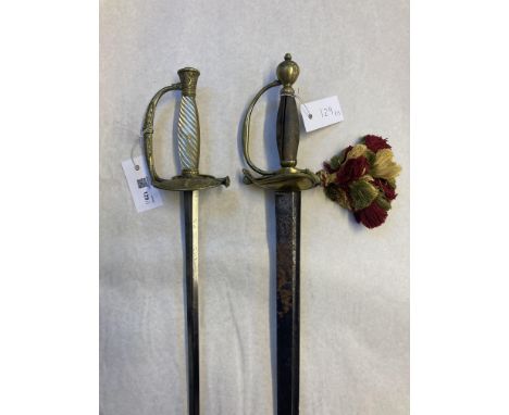 * Swords. An early 19th century court sword by P ... Solingen, the 81 cm straight steel blade etched with military trophies, 