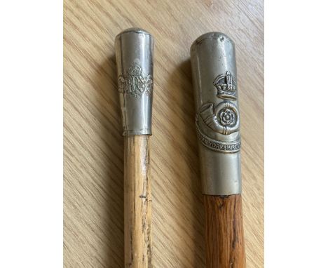 * Swagger Sticks. A WWI Royal Flying Corps swagger stick, bamboo with plated top embossed with RFC wings emblem, 72.5 cm long