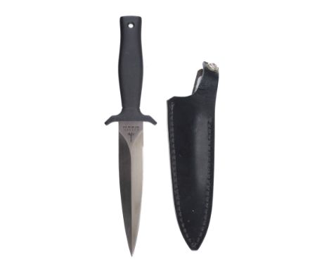 * Gerber Knife.  A Gerber MkI Boot Knife, serial number 'C1629S' in original leather scabbard. Gerber logo to ricasso togethe