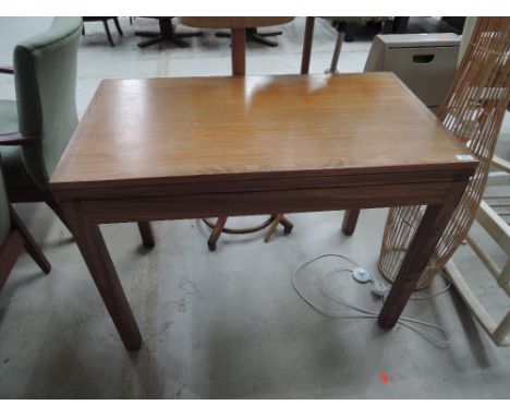 A vintage Beautility fold over card table , dated Dec 1970