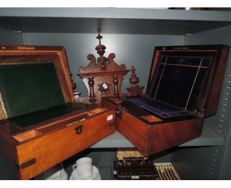 Two lap desks one with brass fitments and a carved wall clock top