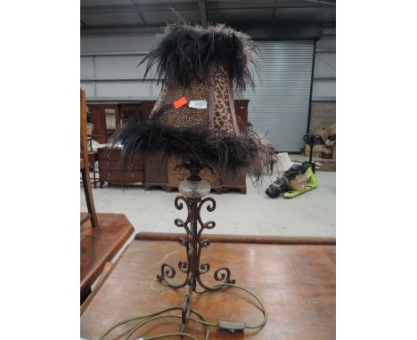 A boudoir style table lamp