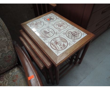 A vintage nest of tile top tables