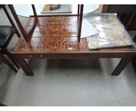 A vintage tile top coffee table