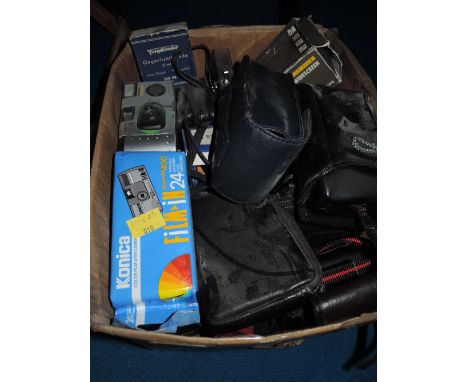 A box of various instamatic cameras etc