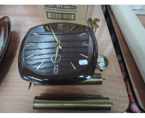 A 1970s wall clock, branded Hermie