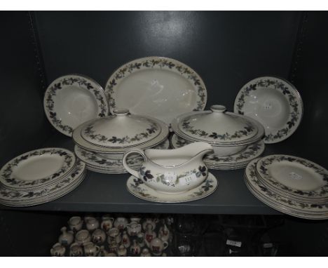 A part tea or dinner service by Royal Doulton in the Burgundy design