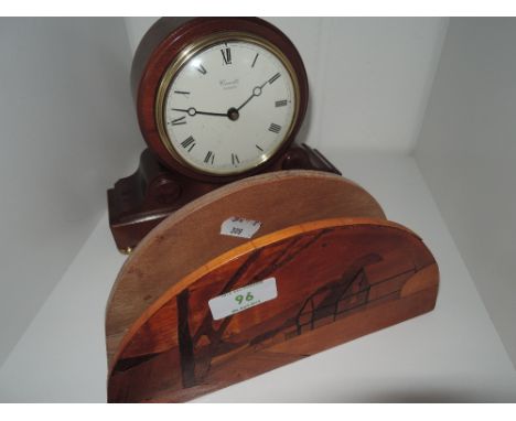 A Comitti, London mantel clock and treen letter rack