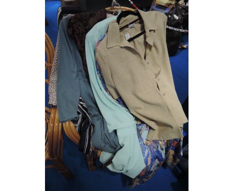 A small lot of ladies clothing (mostly 1980s), including a house coat, dresses and a blouse, larger sizes,good condition.