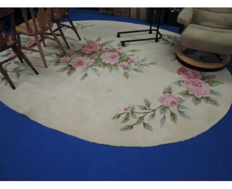 A vintage large oval carpet square