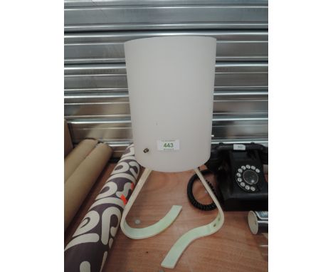 A vintage table lamp having acrylic perspex style base