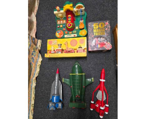 CARTON OF MISC CHILDREN'S TOYS INCL; A BOX OF MAGIC TRICKS, A THUNDERBIRDS II AIRCRAFT, 2 OTHER ROCKETS, A WOODEN TRAIN SET &