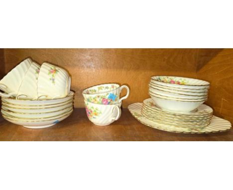 SHELF OF DECORATIVE CHINA CUPS & SAUCERS & MATCHING TEA PLATES