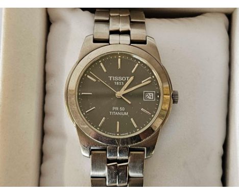AN UNUSUAL TISSOT TITANIUM GENTS S.S WRIST WATCH - BOXED (W/O)