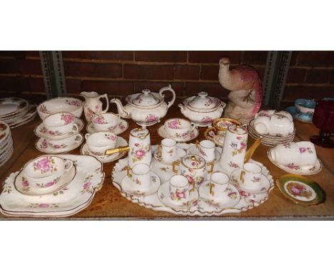 SHELF WITH A COFFEE SET BY G.D & CO, LIMOGES FRANCE, 1 OTHER UNKNOWN PART TEA SET & A BIRD WITH CHIPPED BEAK