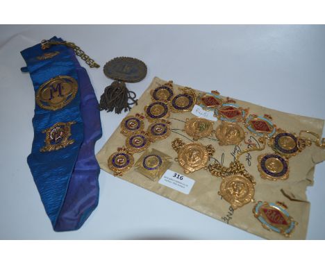 Collection Raob Gilt Enameled Medallions and a Sash 