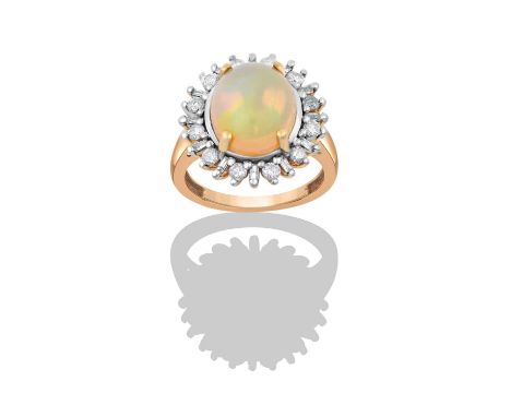 A 9 Carat Gold Opal and Diamond Cluster Ring, the oval cabochon opal in a yellow four claw setting, within a border of eight-