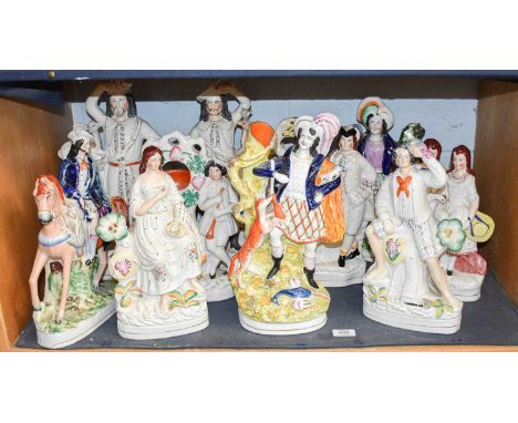 Ten Large Victorian Staffordshire Pottery Figures, including a mounted Highlander with deer, pocket watch stand, haymakers an