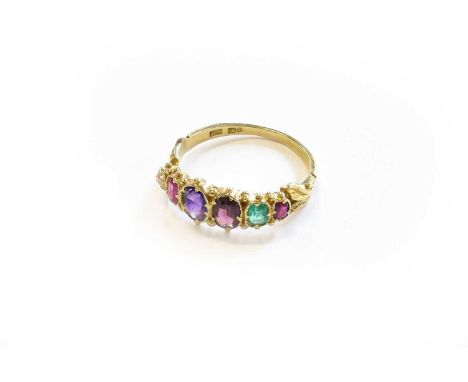 An 18 Carat Gold 'REGARD' Ring, the graduated ruby, emerald, garnet, amethyst, ruby and diamond in yellow claw settings, to a