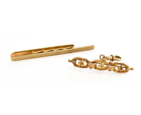 A 9 Carat Gold Tie Clip; and A Brooch, with attached clip stamped '9CT', length 4.6cmTie clip - 6.3 grams. Brooch - 3.5 grams