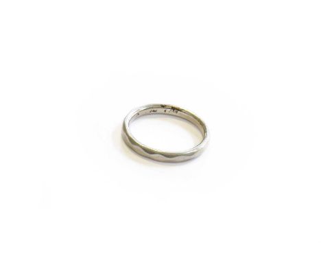 A Band Ring, stamped 'PLATINUM', finger size HGross weight 3.5 grams.