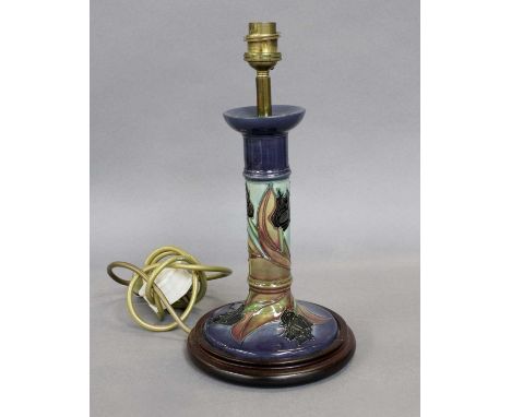 A Modern Moorcroft Lamp, Tulip Pattern designed by Sally Tuffin, black colourway, 30cm high incl. light fitting