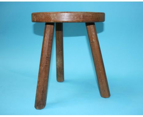 A Mouseman style oak stool, the top carved with a Cat's head (no Mouse)