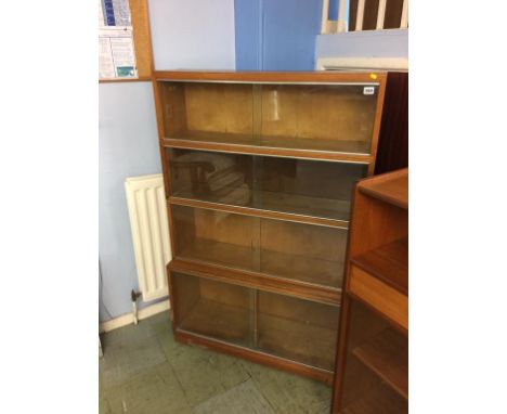 A light oak four tier bookcase.  89cm wide