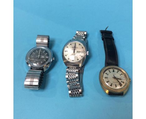Three gents wristwatches, to include a Timex etc.
