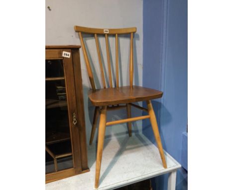 An Ercol stick back single chair